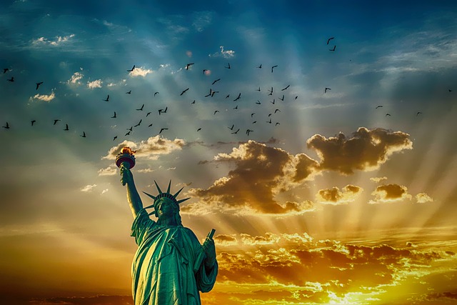 Image of the Statue of Liberty with a sunset in the background